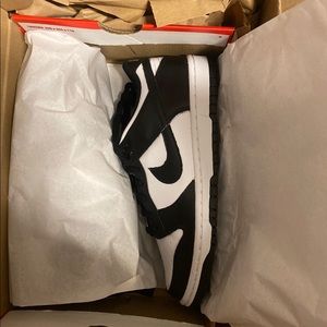 Black and white Nike dunks.